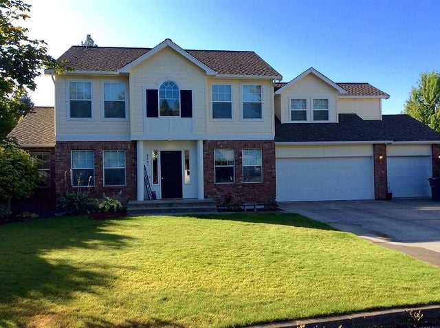 white and brick exterior home