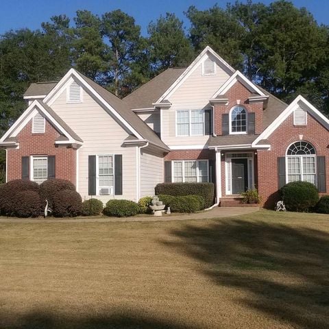 white and brick home