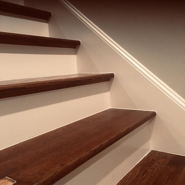 white and hardwood stairs