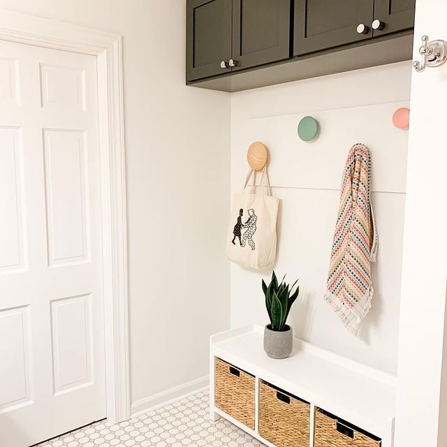 white bathroom with hangers