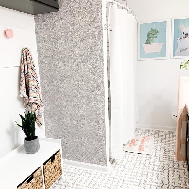 white bathroom with tile flooring