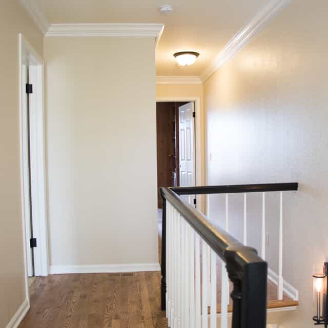 white bedroom with doors open