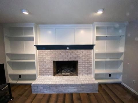 white cabinet and white brick fireplace