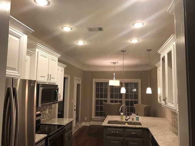 white cabinets with lights