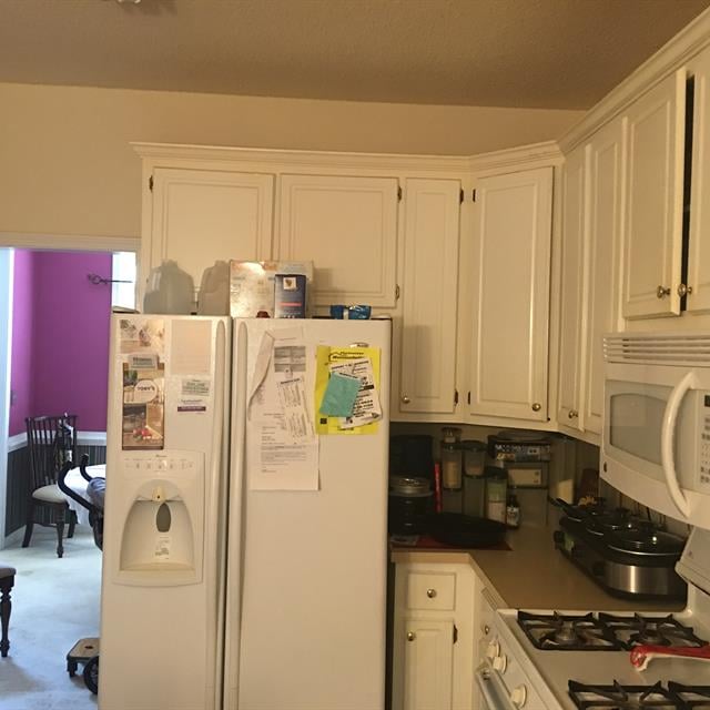 white kitchen with white appliances 