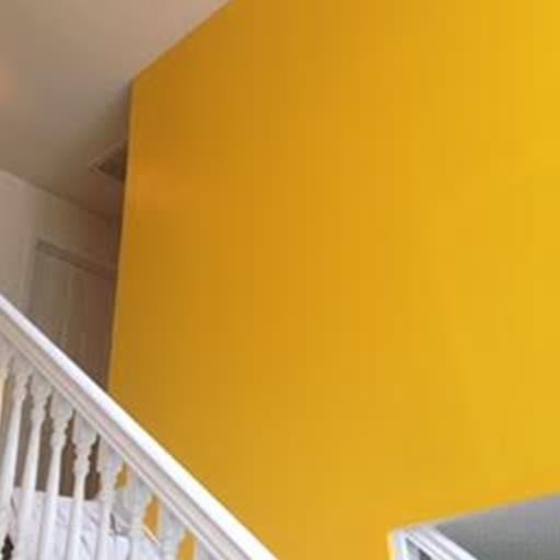 yellow stairway walls