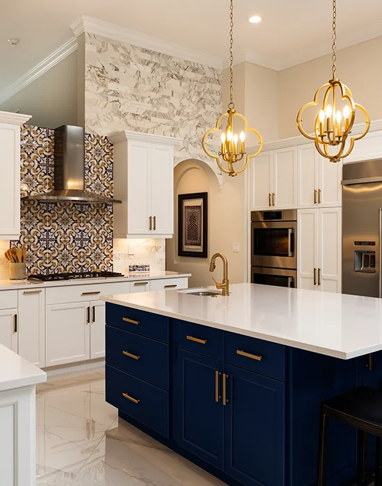 A modern kitchen with blue & white cabinets painted by Five Star Painting