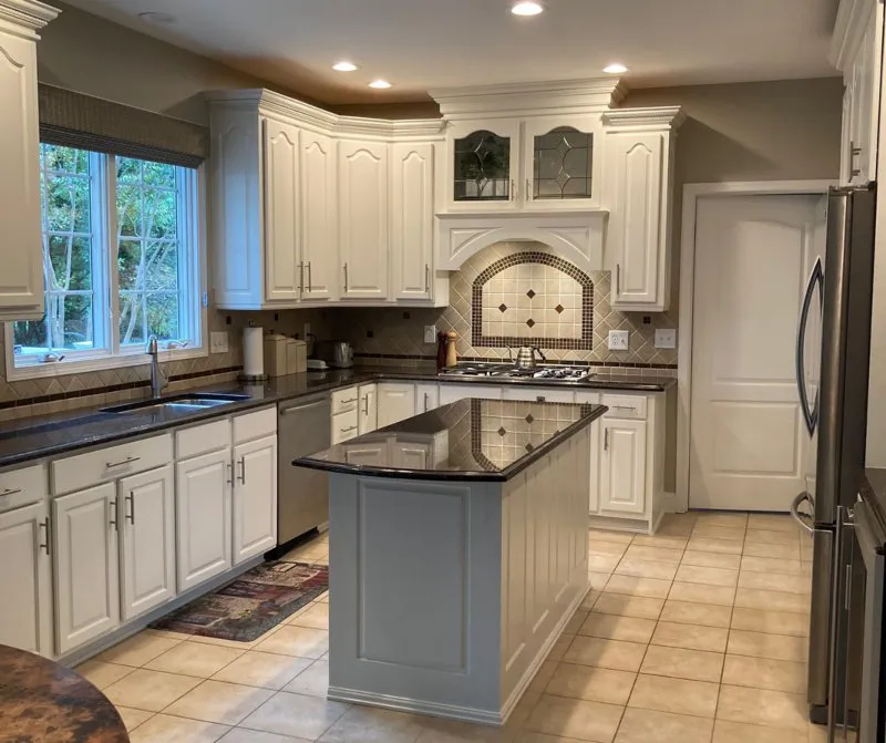 Cabinet refinishing in kitchen done by Five Star Painting