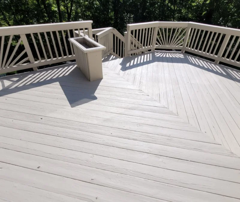 Large off-white patio after deck painting service from Five Star Painting