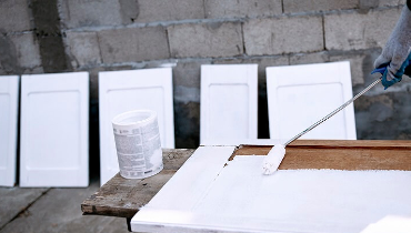 Cabinets being painted white
