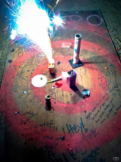 Firework Driveway Stain Prevention Firework going off on a dirty concrete floor.