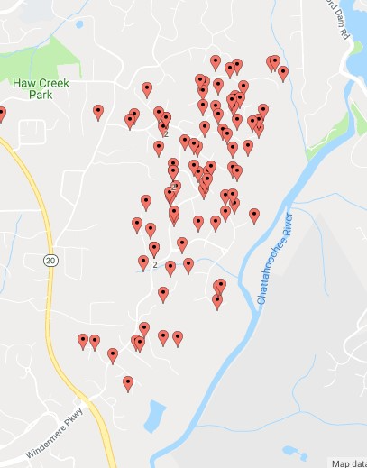 Map with multiple red markers on it.