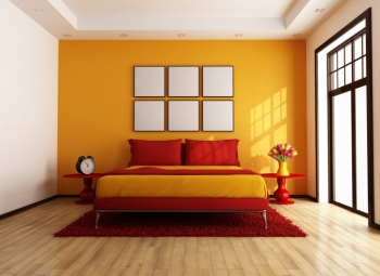 Bedroom with orange accent wall Bedroom with orange accent wall