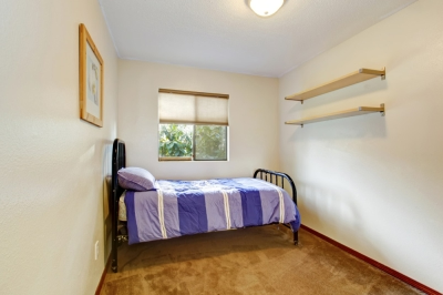 Make the Bed Small room with small, blue bed