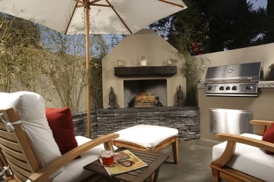 Outdoor Patio Furniture Care: Fabric Wooden outdoor furniture next to a wooden fireplace