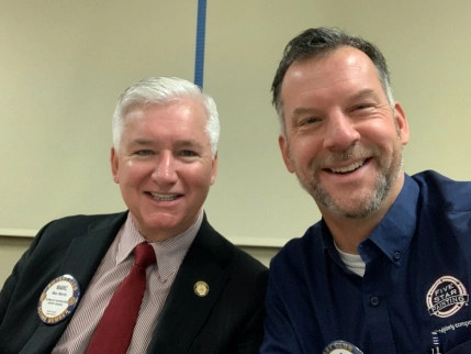 Scott and Man in suit.