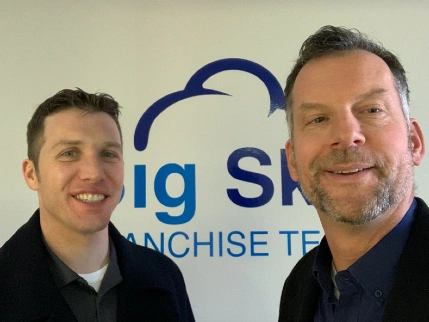 Scott and person in black shirt.