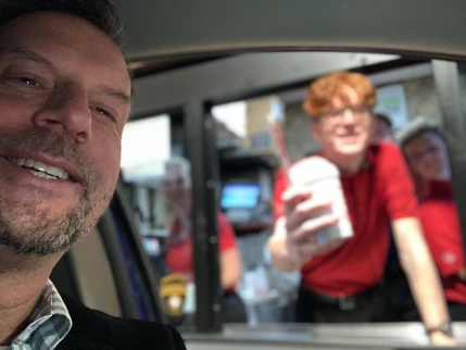 Scott at fast food drive through.