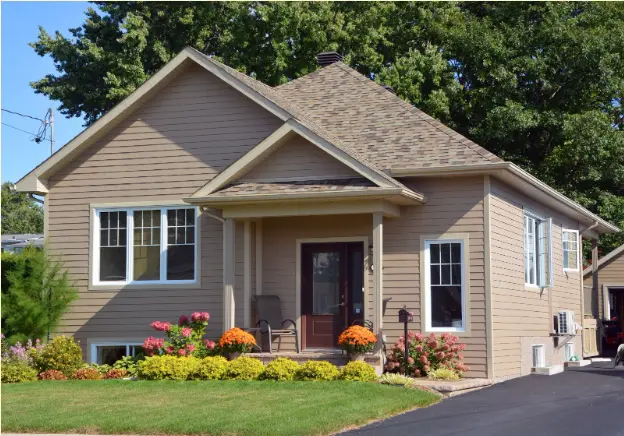 Freshly painted house with vinyl siding.