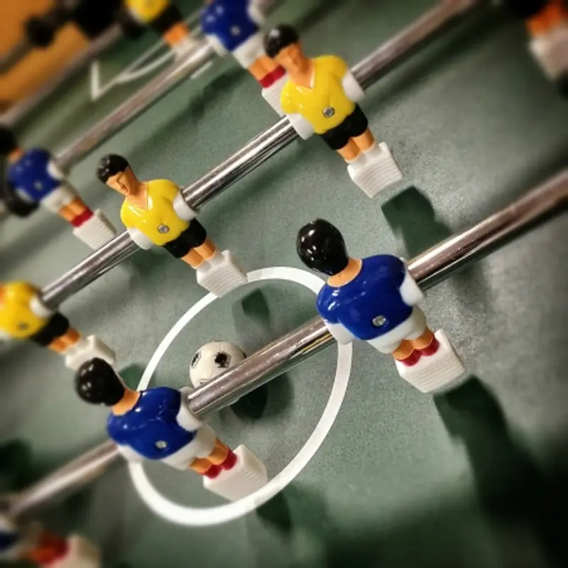 Rec Room Games Close-up of table soccer figurines.